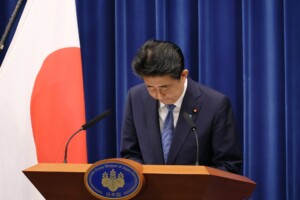 Former prime minister of Japan Abe bowing during his resignation. 